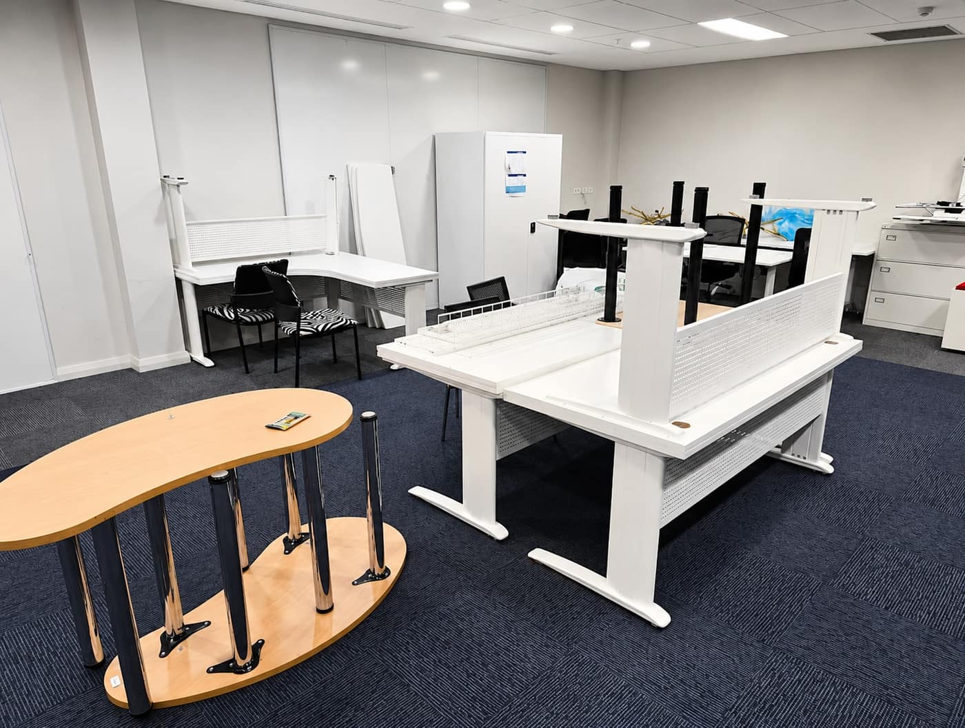 Office relocation with desks and IT equipment being loaded